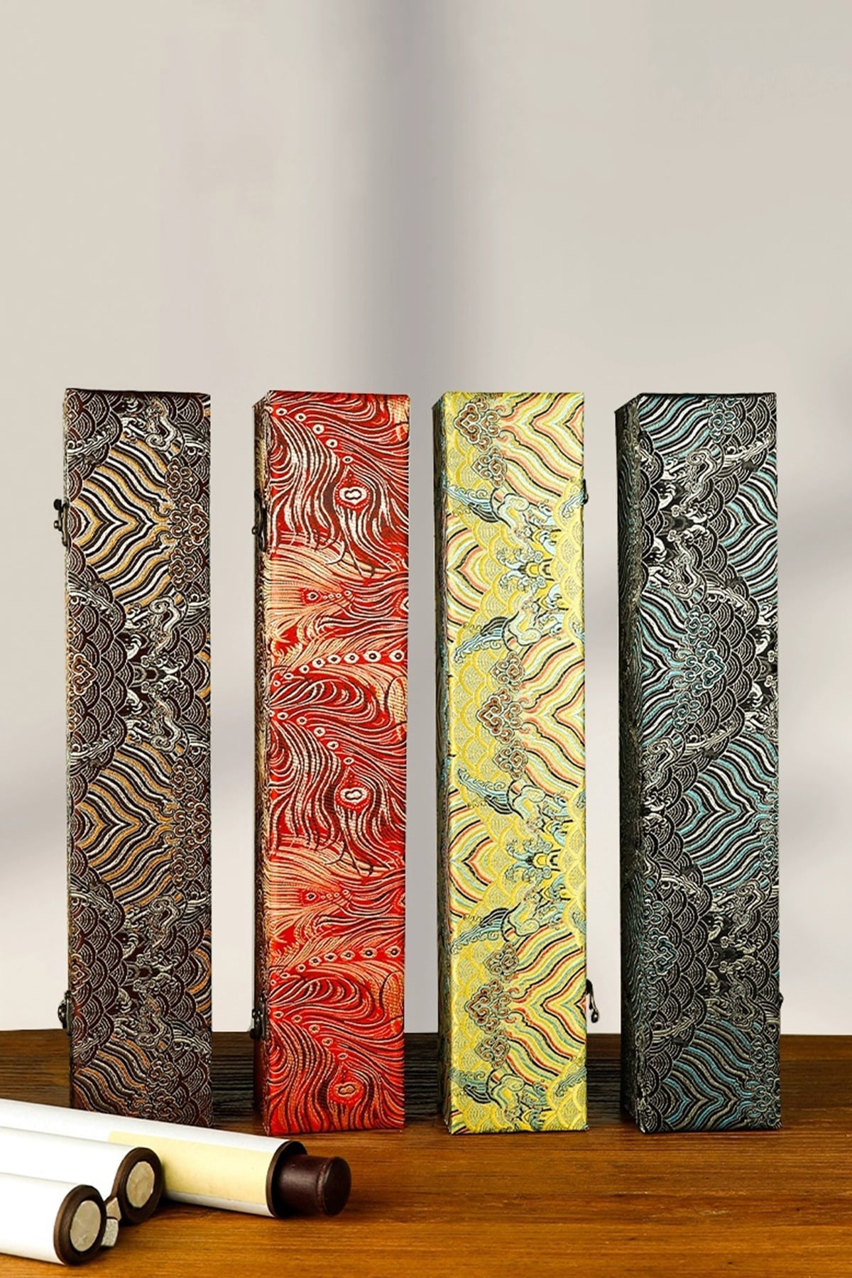 Exquisite gift box packaging display of calligraphy works in different colors.